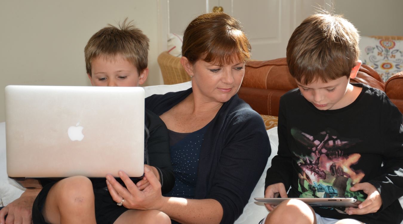Mother with boys online, internet safety